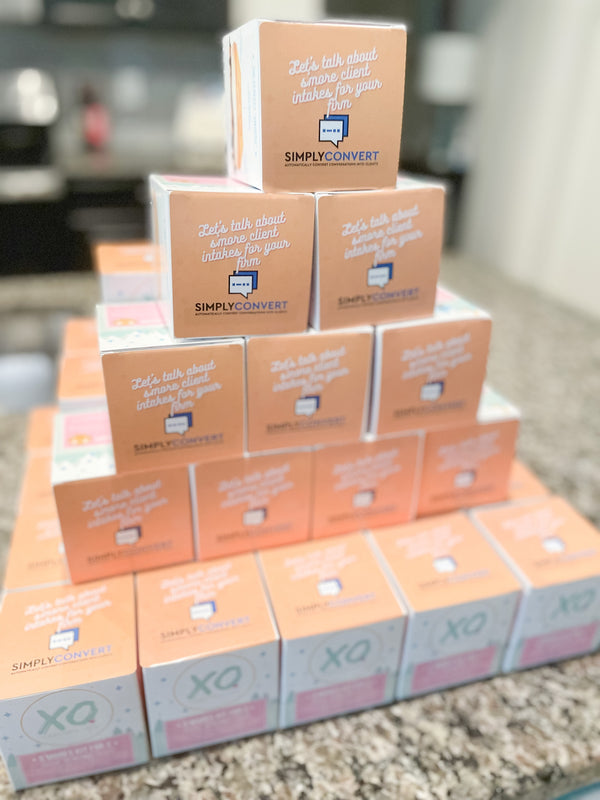 Stack of XO S'more kits as part of a corporate gifting project.