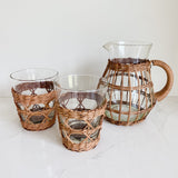 Pitcher and tumblers in rattan from Kiss that Frog.