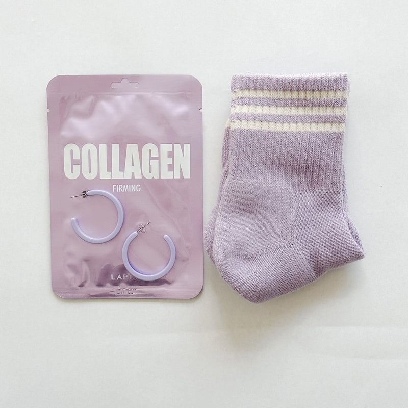 Send them some lavender love with collagen face mask, socks and hoop earrings from Nat & Noor.
