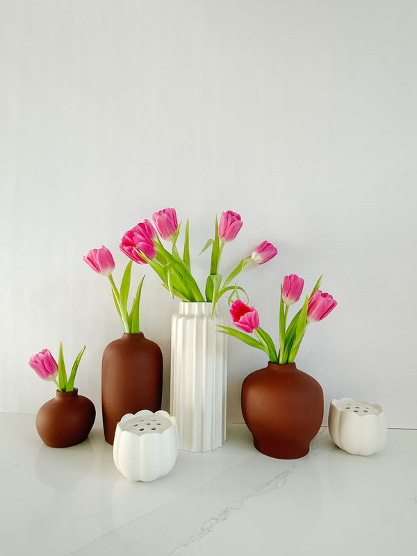 A collection of vases in neutral colors make the perfect gifts for the host, new job, or for their birthday!