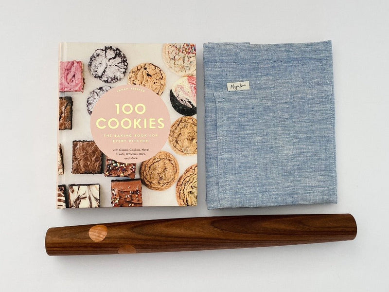 A great gift complete with 100 Cookies cookbook with a magic linen apron and beautiful wood patisserie pin from Untitled Co.