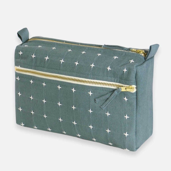 Spruce colored toiletry bag.  Fair Trade Verified and features a hand-stitched signature of the maker.