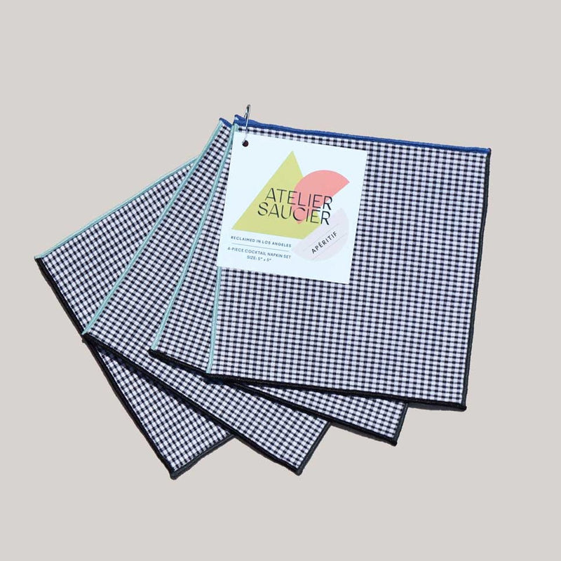 Stack of navy and white gingham cocktail napkins.  Perfect gift for hostess.