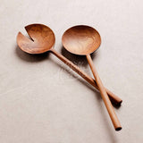 Wooden Salad servers from Bali Harvest pair well with a cookbook for the perfect gift.