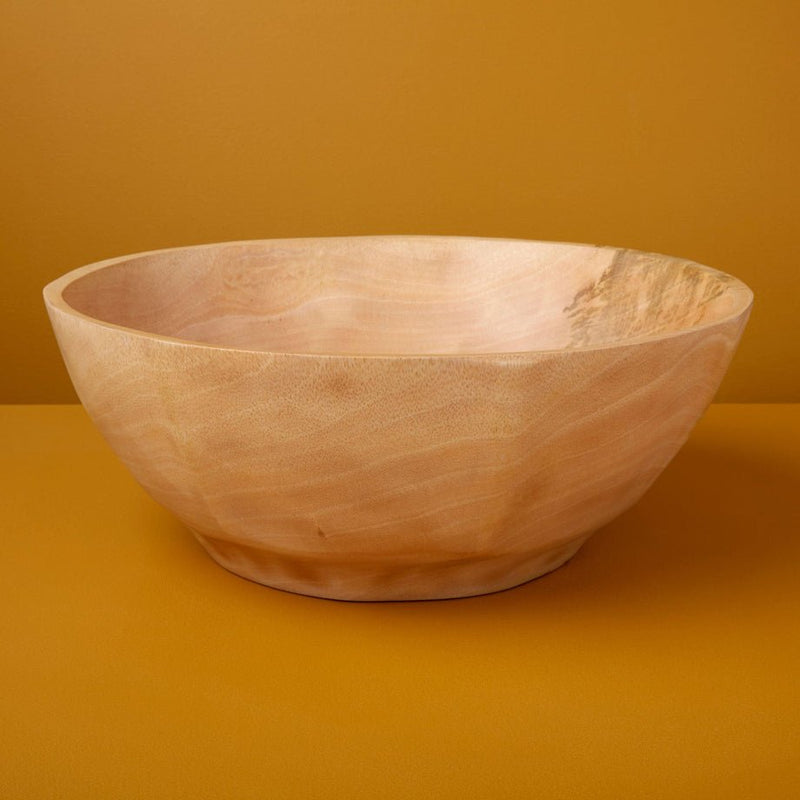 A beautiful mango wood bowl from be HOME.
