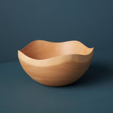 Mango wood wave edge bowl from Be Home. A beautiful addition to any kitchen.