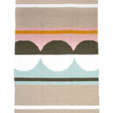 Caminito blanket features shades of taupe, light pink, orange, grey, white, and mint green.
