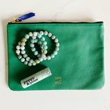 Pretty green leather pouch paired with leap frog stacker and poppy & pout lip balm.