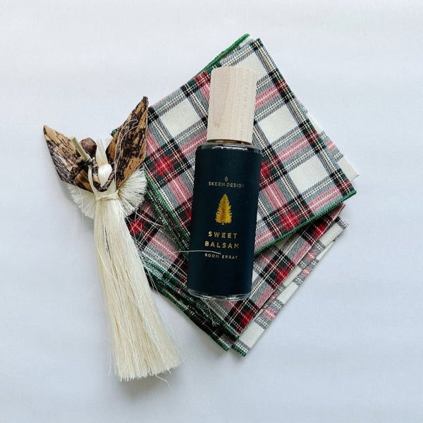 Beautiful Kazi angel ornament paired with tartan cocktail napkins and balsam room spray. Sweet holiday gift.