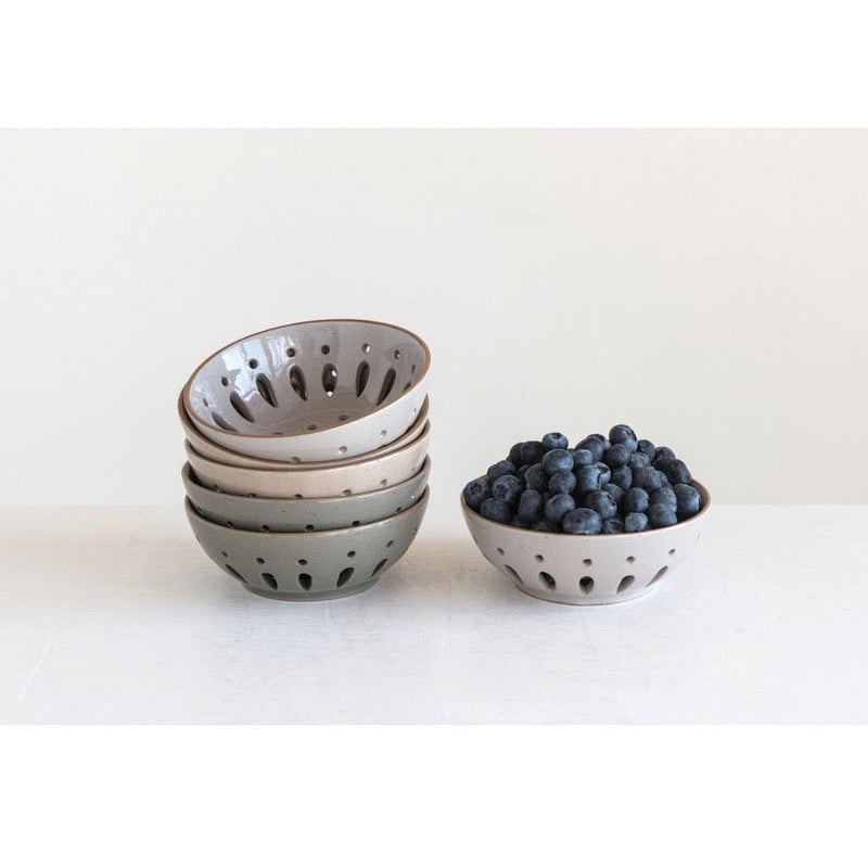 Stack of Stoneware berry bowls.
