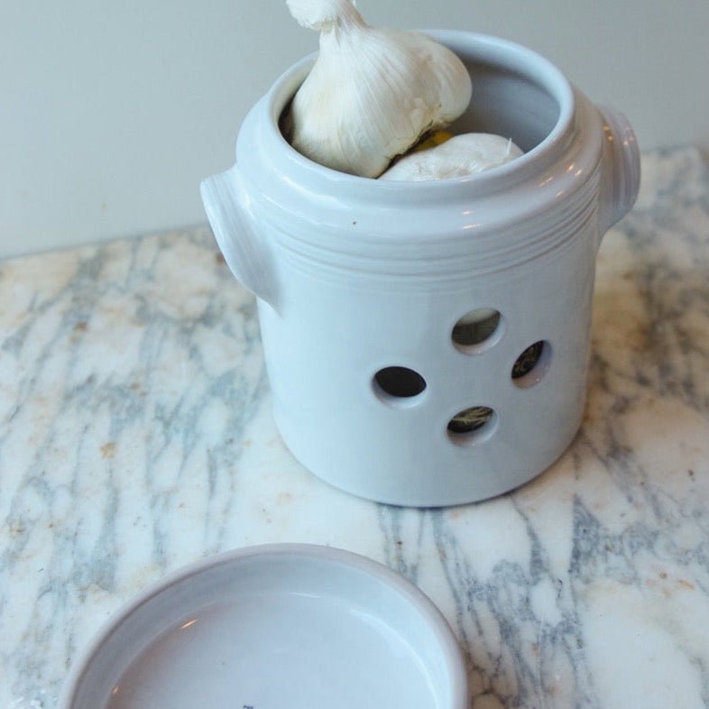 A lovely garlic pot from French Dry Goods is a small and unique housewarming gift.