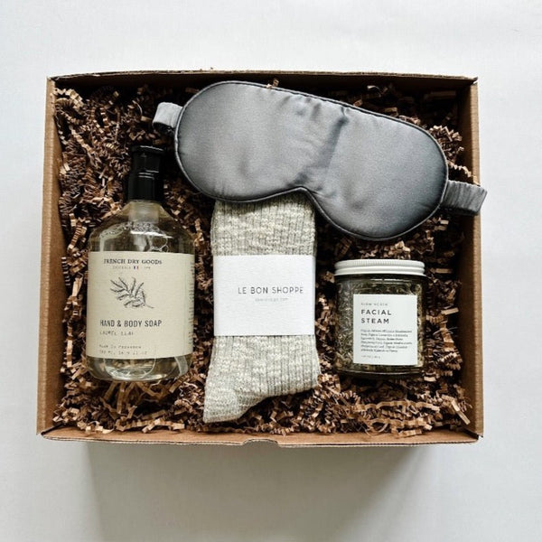 Delightful hand and body soap, facial steam, cozy socks and silk eye mask are the perfect way to show your love.