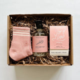 Show them the love with adorable socks, pretty soap and some cup of love tea all in shades of pale pink.