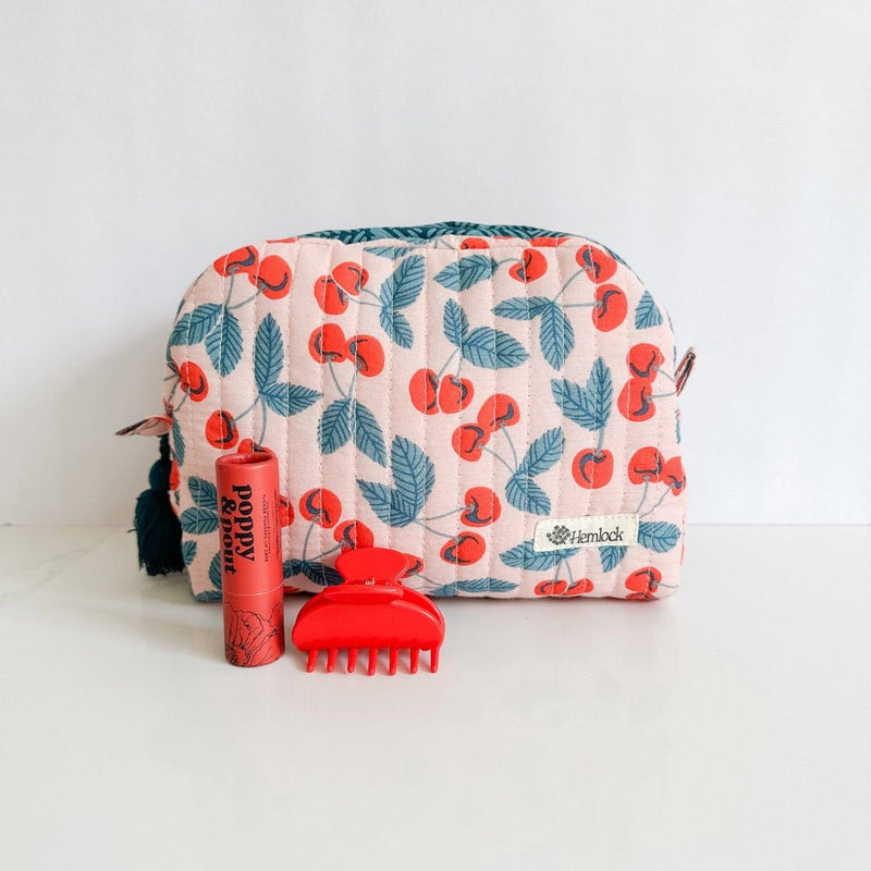 The sweetest gift set featuring Hemlock Goods small bag, poppy & pout lip balm and a cherry red hair claw.