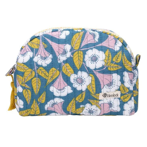 Hemlock Evangeline bag with pink and white flowers on a blue background. Perfect for your purse.