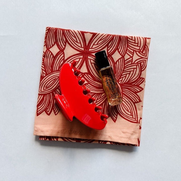 Hemlock Goods bandana paired with cherry red claw clip and cuticle oil. A sweet grad gift.