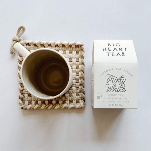 Kate Kilmurray potholder paired with Minty White tea from Big Heart tea Co and a pretty mug.