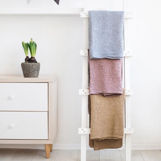 Blanket ladder featuring Magic Linen baby blankets.