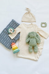 The softest sage colored bunny from OB Design as part of a newborn baby gift. 