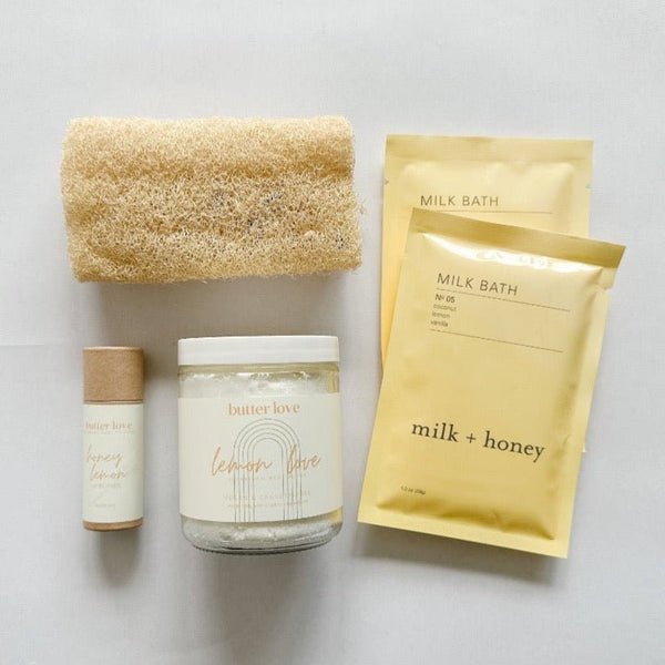 Milk and Honey milk bath, butter love body butter and lip balm and a luffa make a delightful combo in pale yellows.