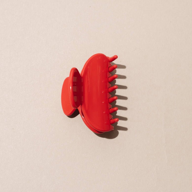 Nat and Noor 2 inch hair claw in cherry ride makes the cutest hair accessory!