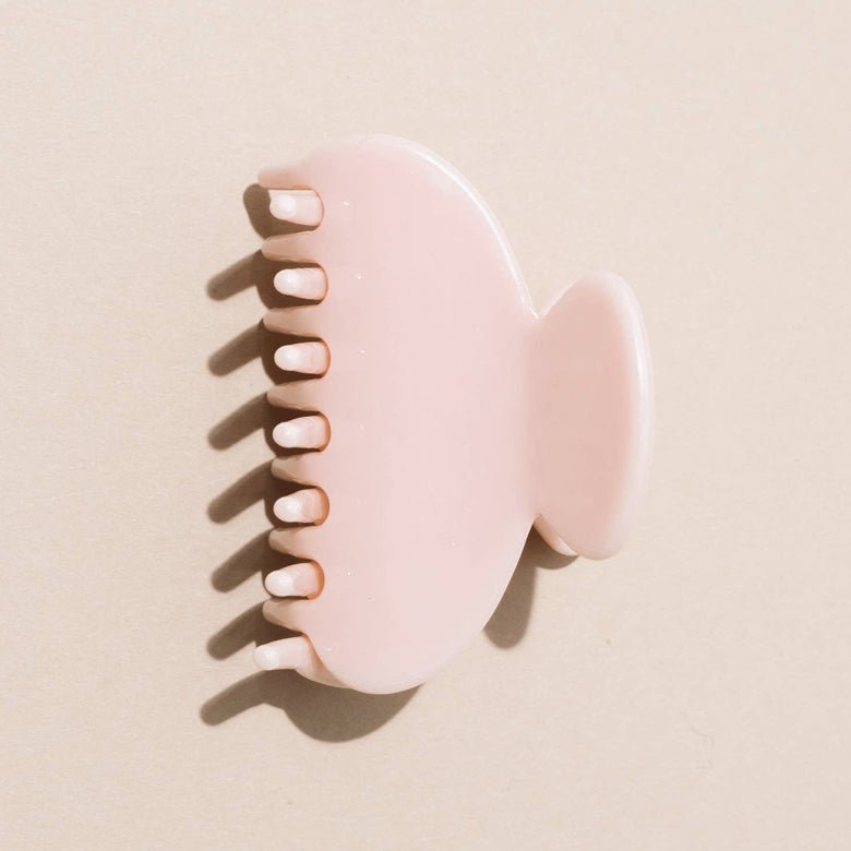 This Nat and Noor 2 inch hair claw is the prettiest shade of rose and should be added to any beauty gift.
