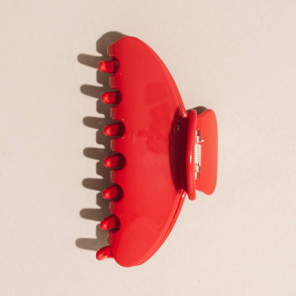 A large and durable cherry red hair claw from Nat and Noor makes a great hair accessory gift.