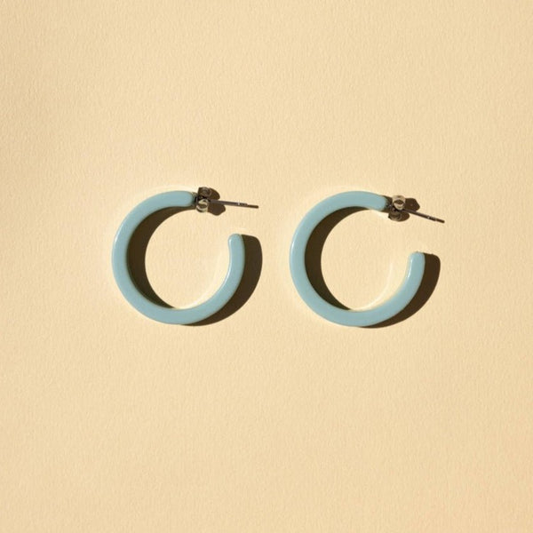A beautiful shade of turquoise in this Sol Hoops from Nat and Noor is a nice touch to our spring and summer wardrobe.