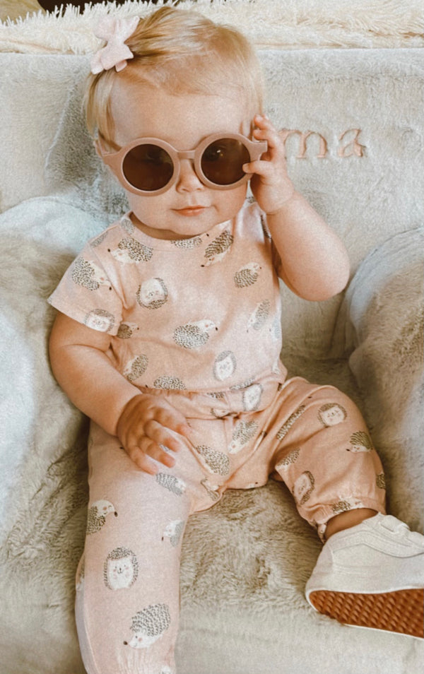 Adorable baby girl wearing polished prints sunglasses.  Cute baby or toddler gift.