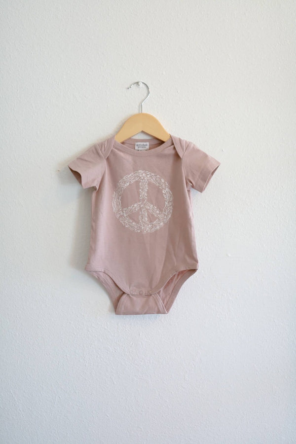 Peace Floral Onesie from Polished prints.