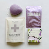 Pursoma foot bath paired with konjac sponge, collagen face mask and lavender mint shower steamers.