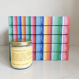 Rainbow Atlas paired with Wanderlust candle from Anecdote candle co. Perfect for the travel lover.