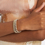 A classic gold bracelet set is the perfect gift for her!