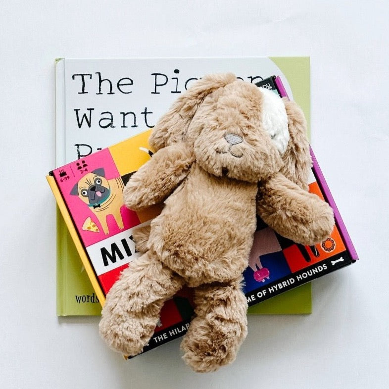 The Pigeon Wants a Puppy book paired with Mix the Mutts game and the cutest stuffed puppy dog.