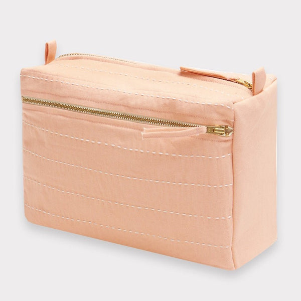 Pink toiletry bag from Anchal makes an awesome birthday gift when filled with lots of beauty items.
