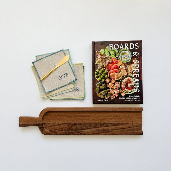 Boards and Spreads paired with a beautiful board, fun cocktail napkins and a cheese knife - makes the perfect hostess gift.