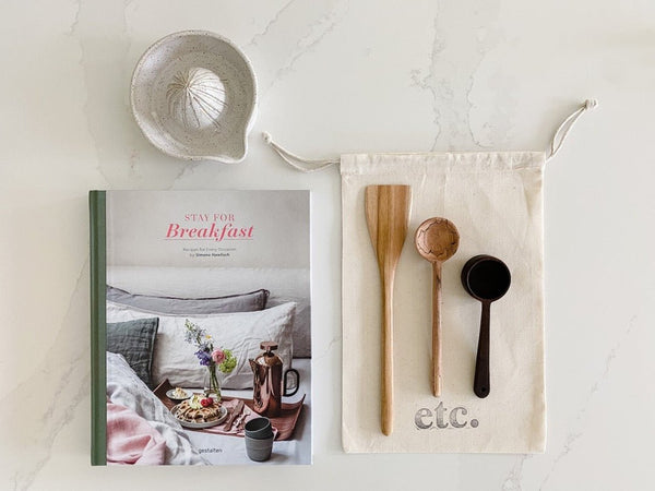 Great gift set featuring Stay for Breakfast, a handmade ceramin juicer and a beautiful collection of wooden breakfast utensils.