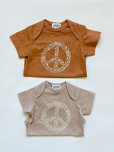 Polished prints floral onesies in fawn and toasty nuts.