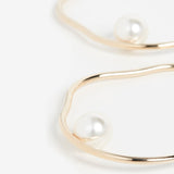 Close-up of the wavy hoop detail and mother of pearl.