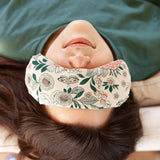 Help soothe migraines with this migraine mask with floral design from Slow North.