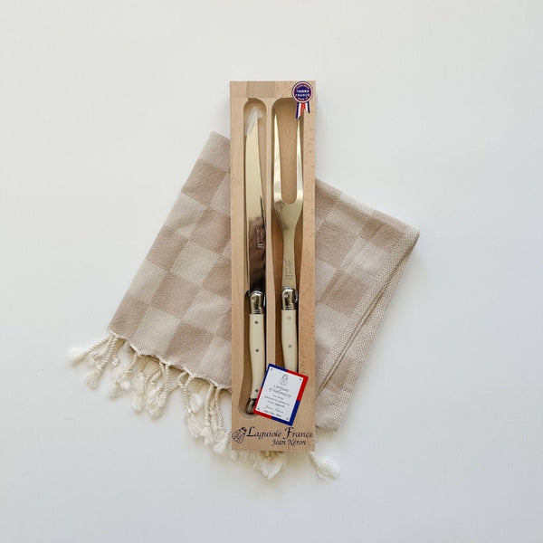 Our best selling Laquiole carving set paired with the beautiful neutral kitchen towel.