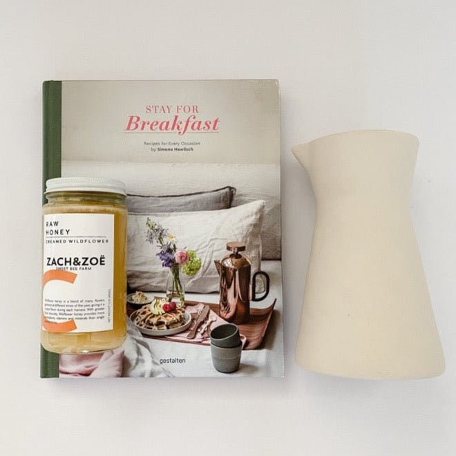 Perfect host gift includes honey, stay for breakfast book and a pretty pitcher.