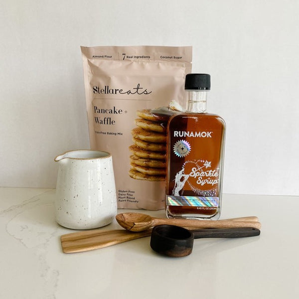 Pancake mix pairs well with this handmade small pour jar, Runamok syrup, and wooden breakfast set from East Third Collective to make the best gift!