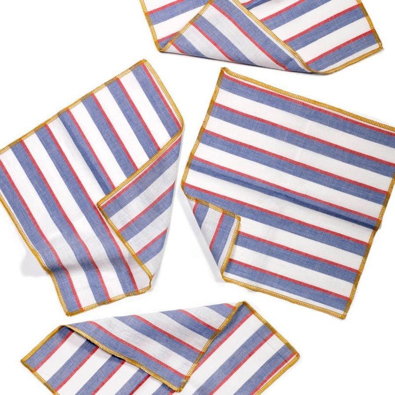 Set of four cocktail napkins from willow ship featuring a blue and red stripe.